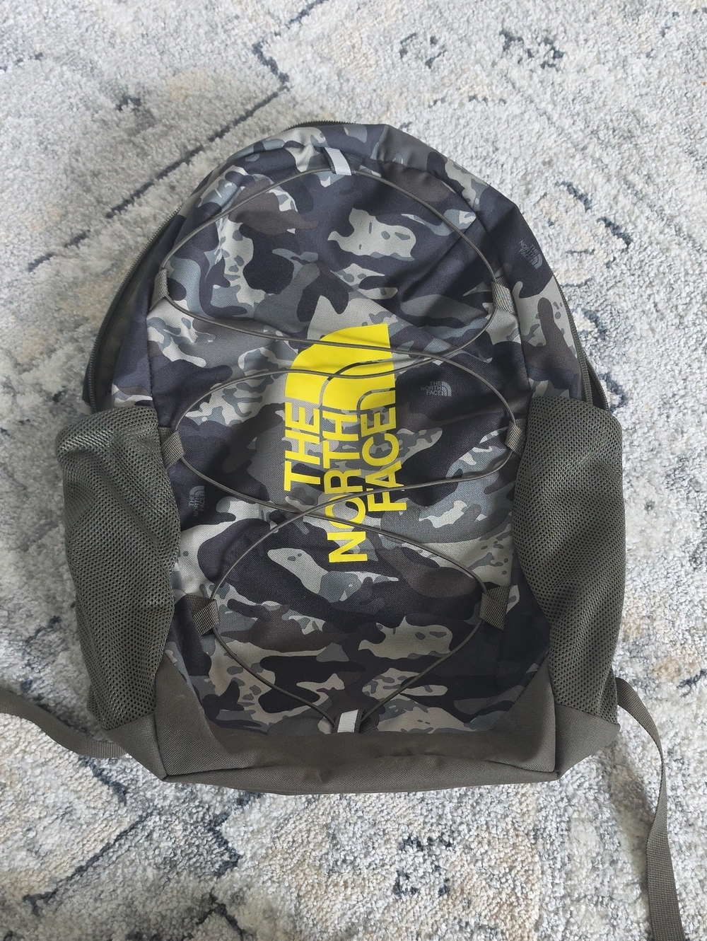 The North Face Olive/Grey Camo Backpack with Yellow Logo